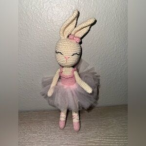 Crocheted amigurumi ballerina bunny doll.